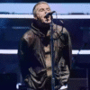 Liam Gallagher Blasts Coldplay’s Viral Kiss Cam Scandal: “We Don’t Do That Snidey S*”** Oasis